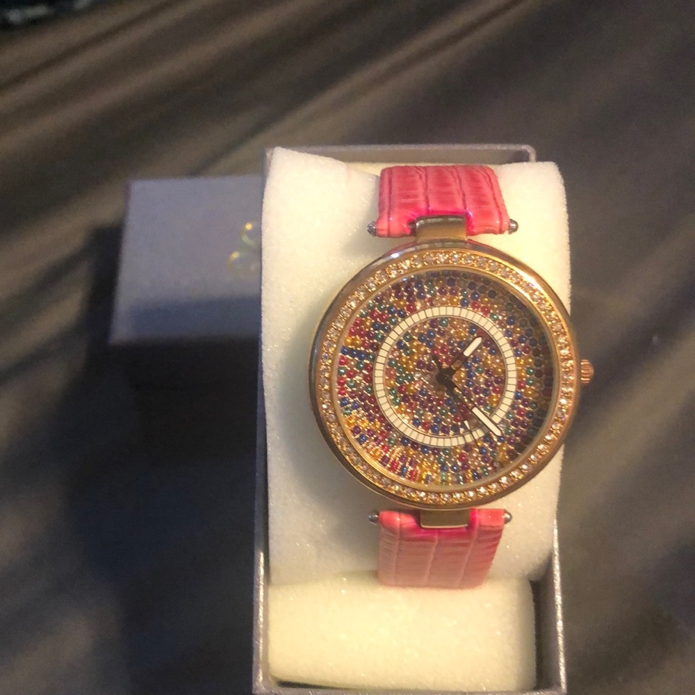 Strada Genoa pink bejeweled face watch. New. In box. Never worn